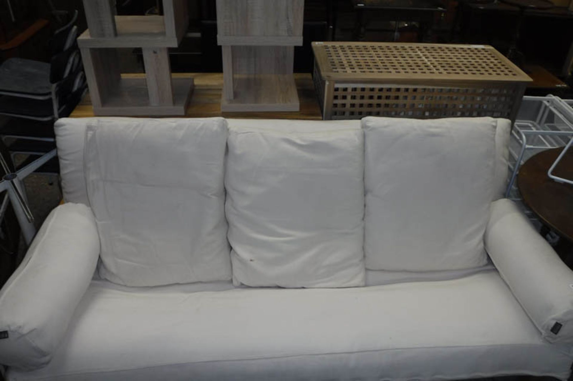 Beech framed futon with beige cushions