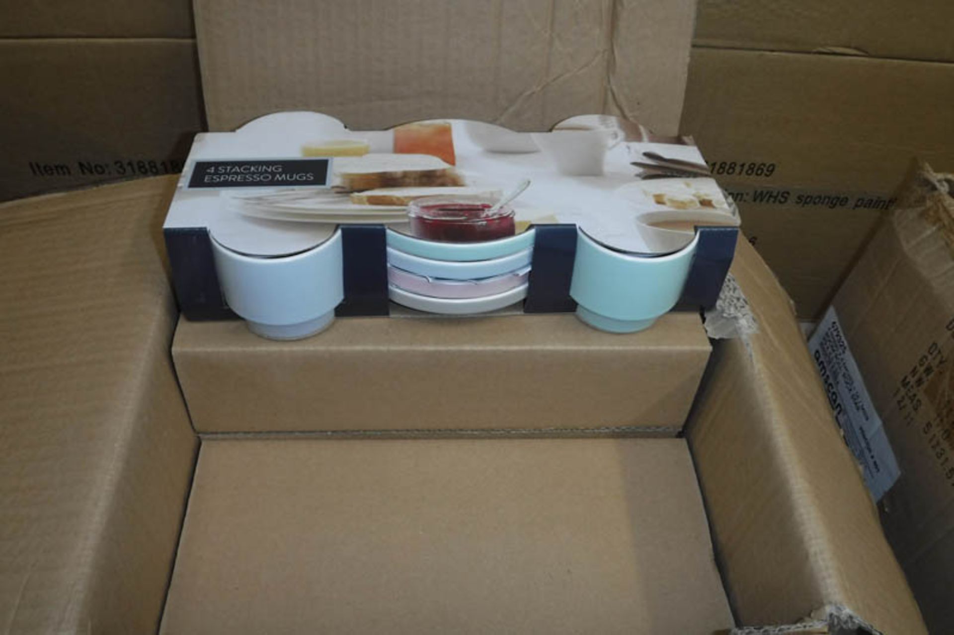 Box containing 6 pastel coloured stacking Espresso cup sets