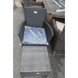 Black rattan garden armchair with footstool