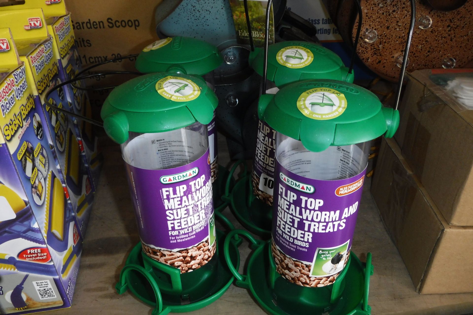 4 plastic bird feeders