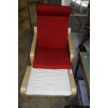 Red upholstered easy chair on beech bent wood frame with similar footstool