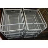 Pair of white mobile 4 drawer wirework trolleys