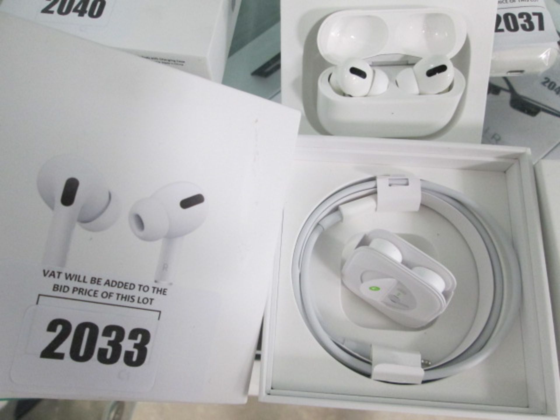 Apple Airpods Pro with wireless charging case and accessories in box