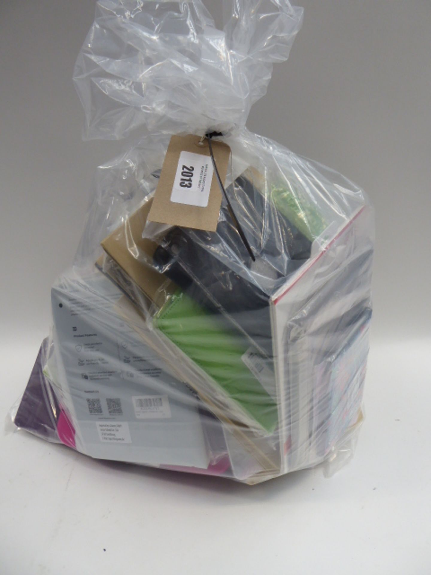 Bag containing quantity of various tablet covers