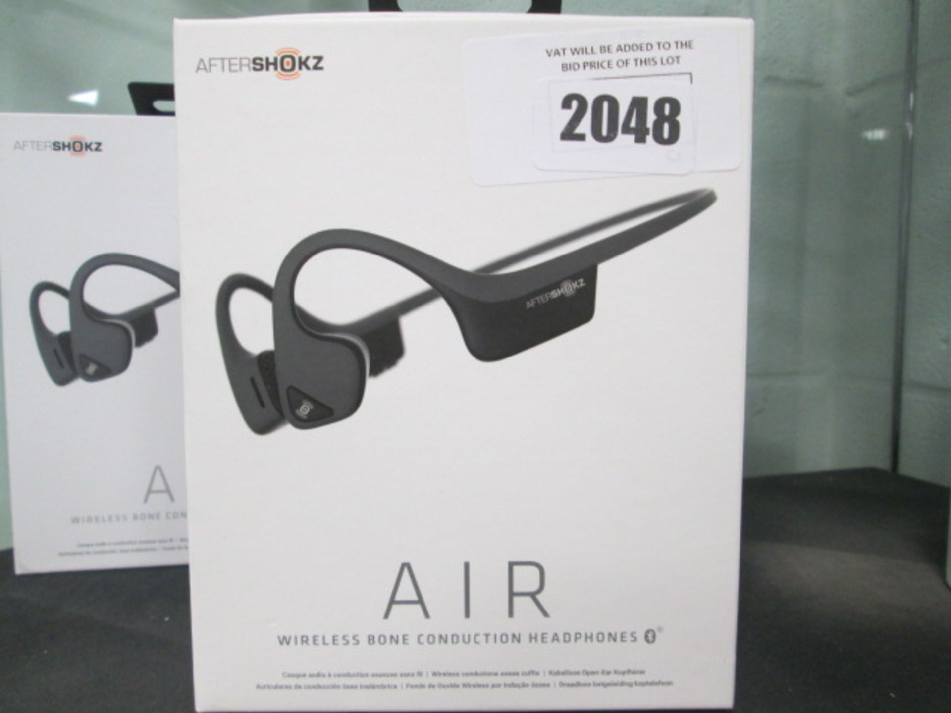 Aftershockz Air wireless bone conduction headphones in box