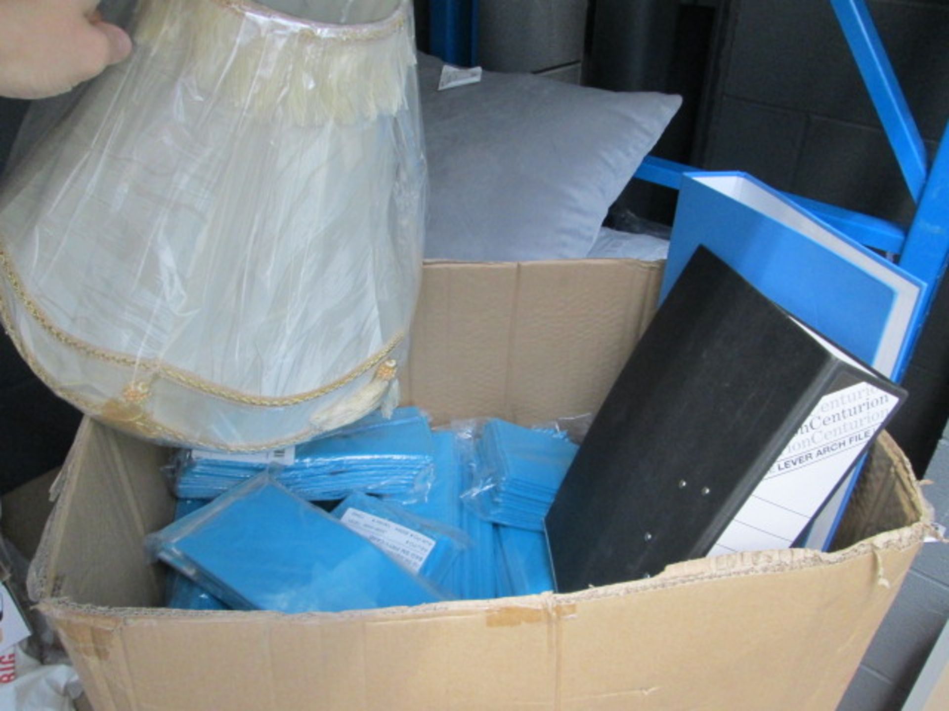 3448 A box of folders, lamp shade and blue party bags