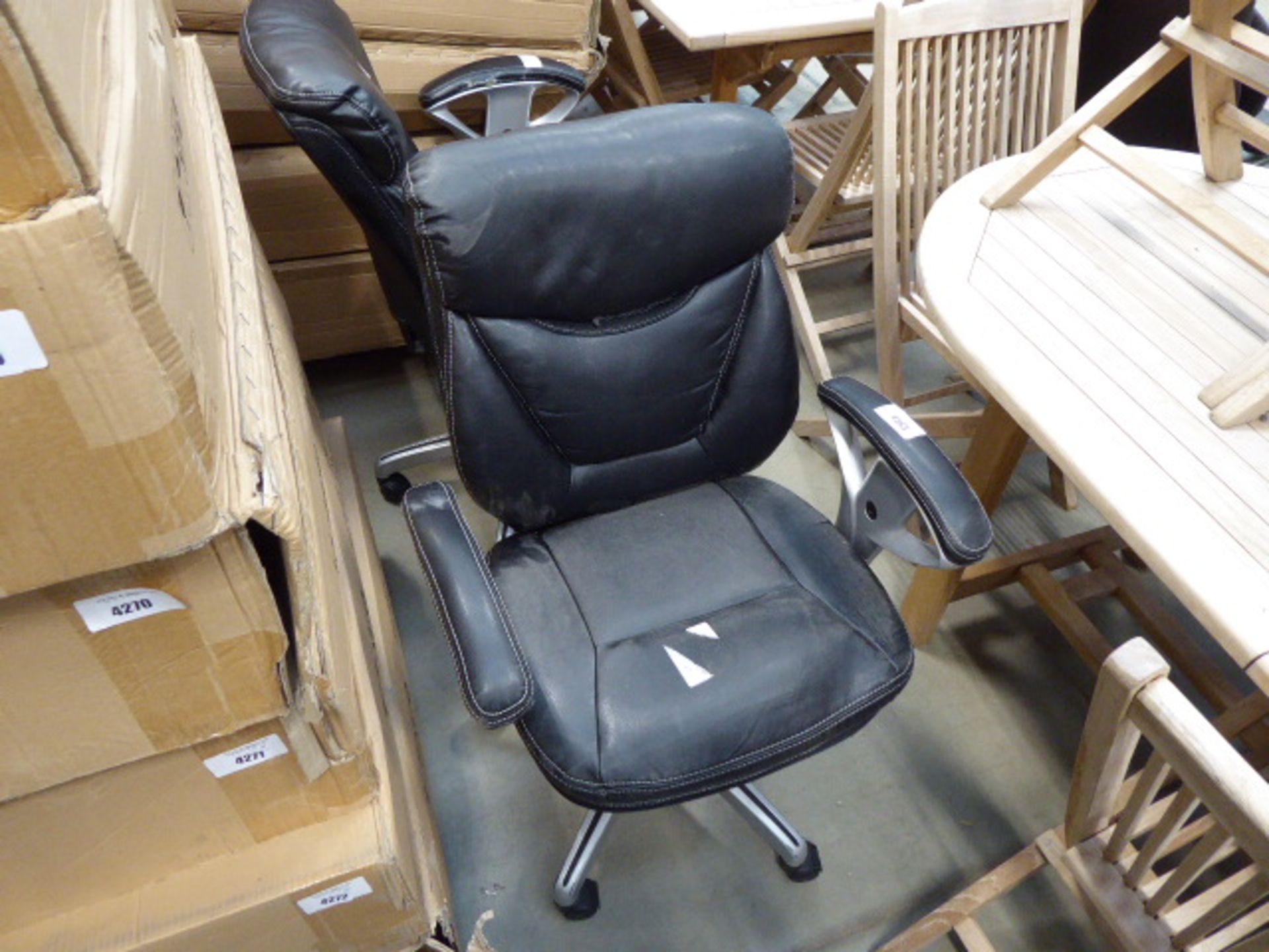 2 black swivel chairs