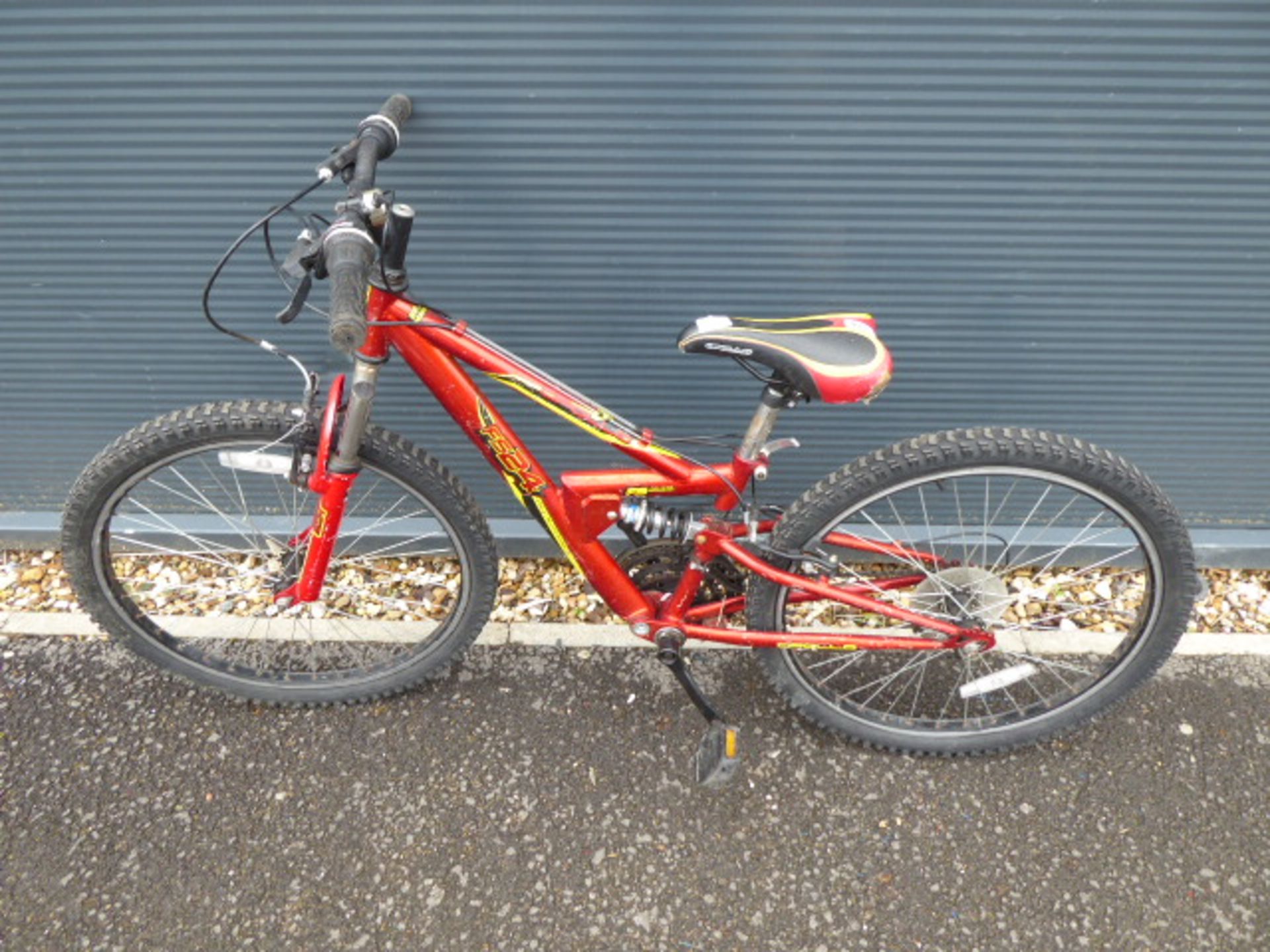 Yellow and red child's suspension mountain cycle