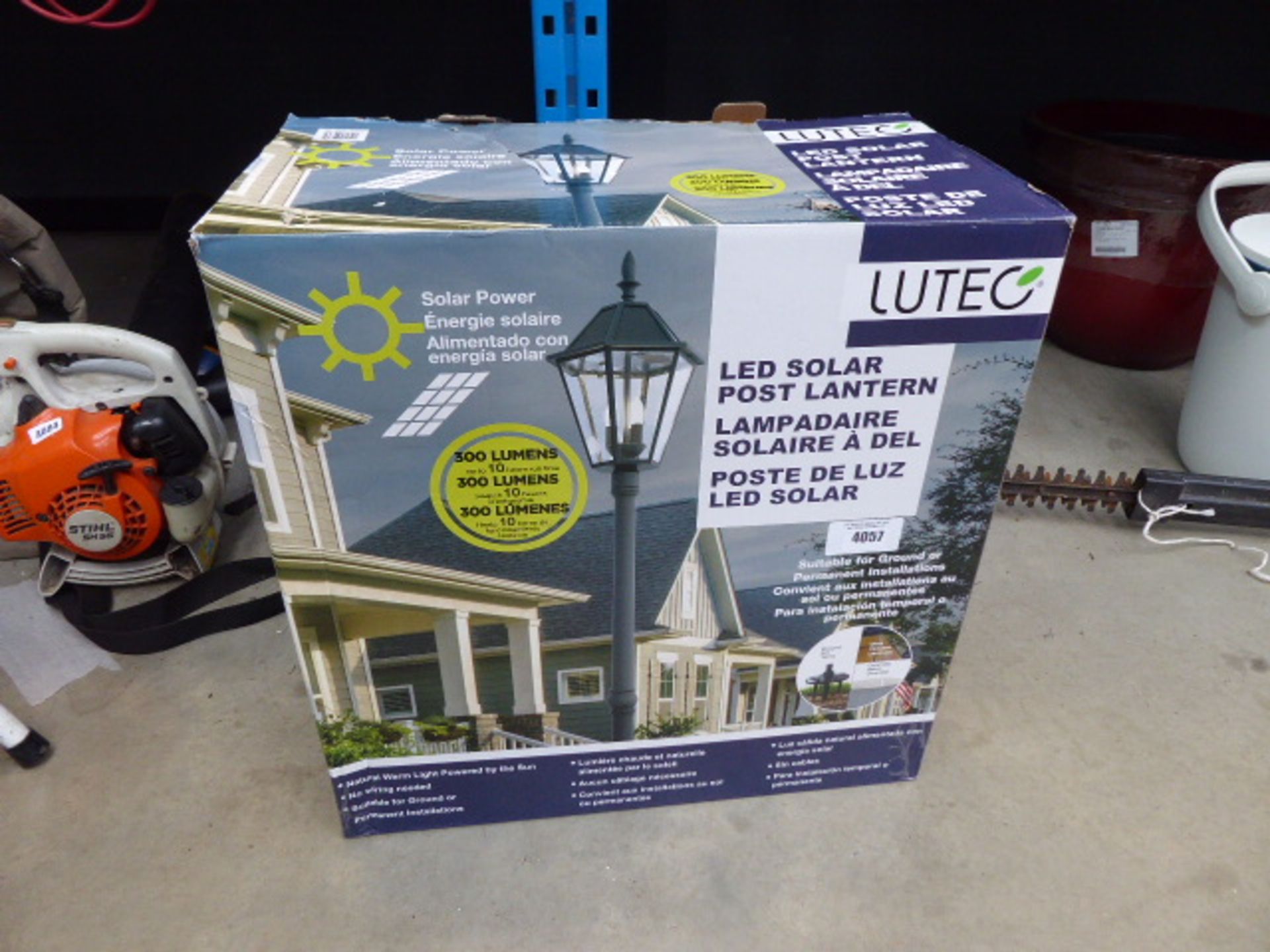 Boxed LED solar post lantern and a bug house