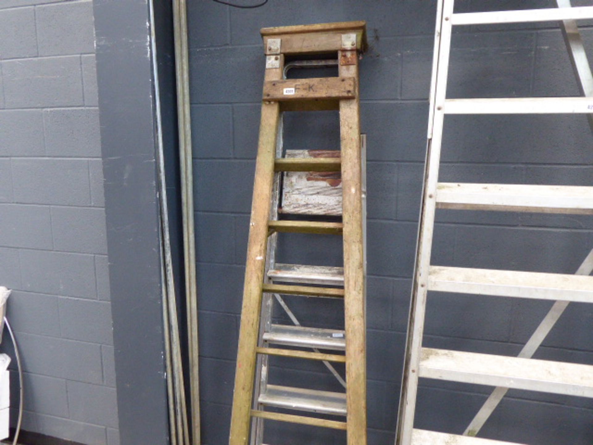 Small aluminium step ladder and small wooden ladder