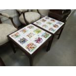 Pair of tile topped lamp tables with coats of arms