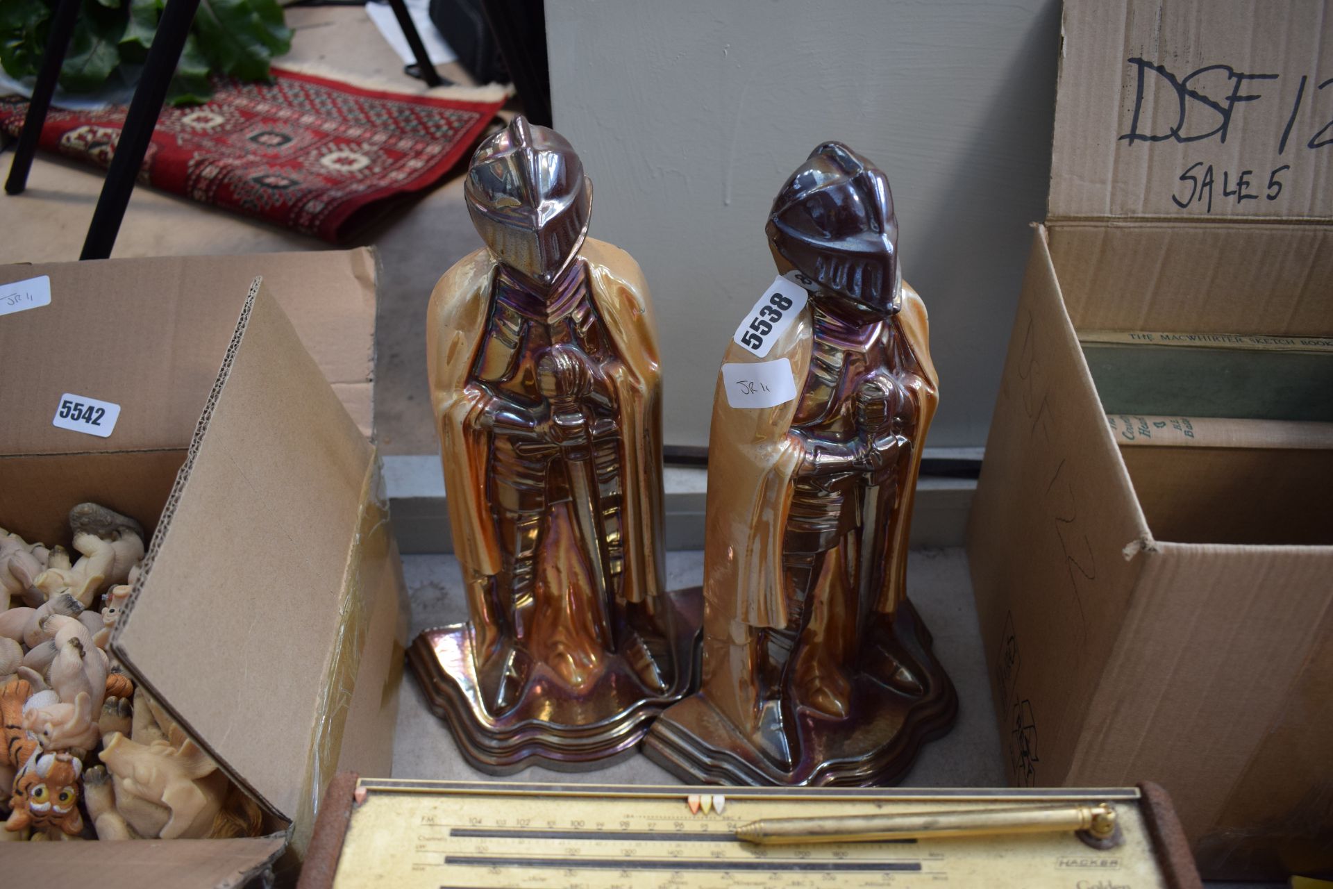 A pair of knight shaped fire companion stands (af)