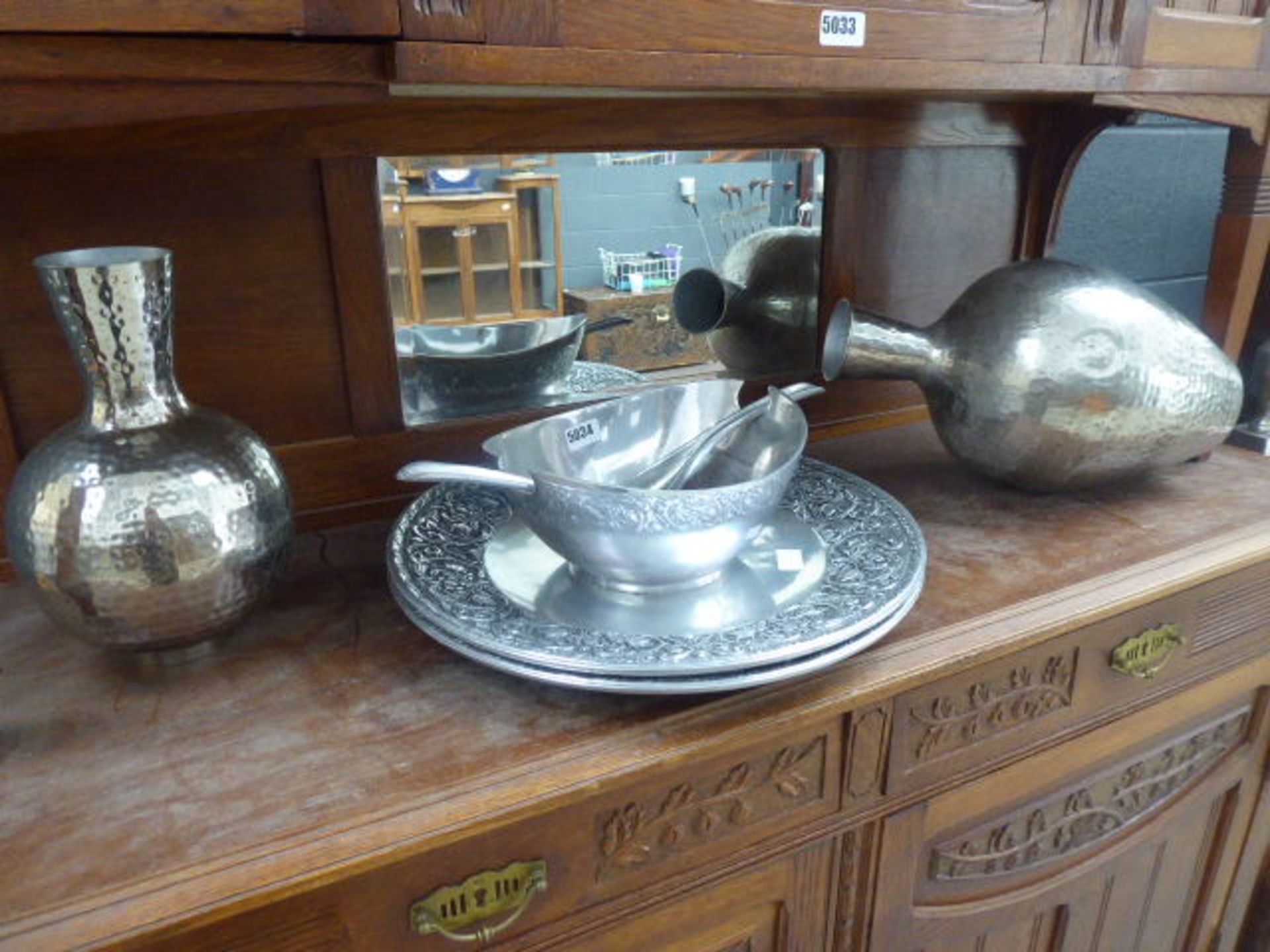 Silver painted metal vases, trays and a salad bowl with servers