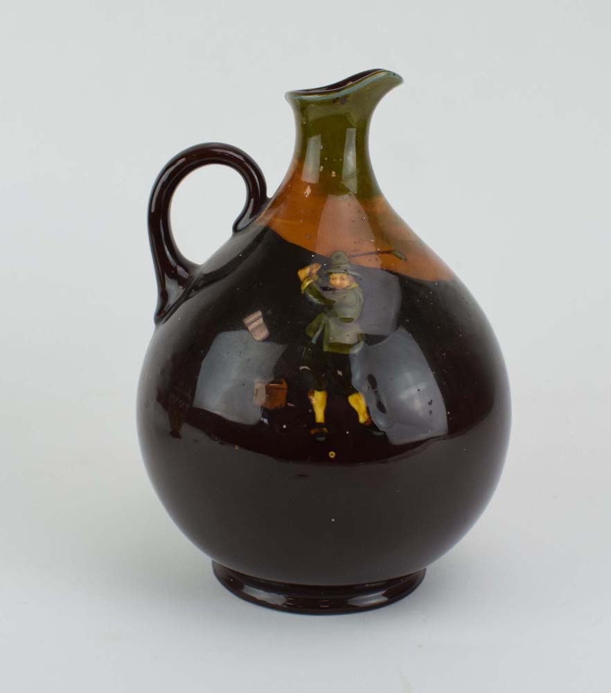 A Royal Doulton jug of ovoid form decorated with a golfer in a treacle glaze, h. - Image 2 of 3