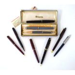 A group of vintage pens including an Onoto Delarue set with a 14ct gold nib,