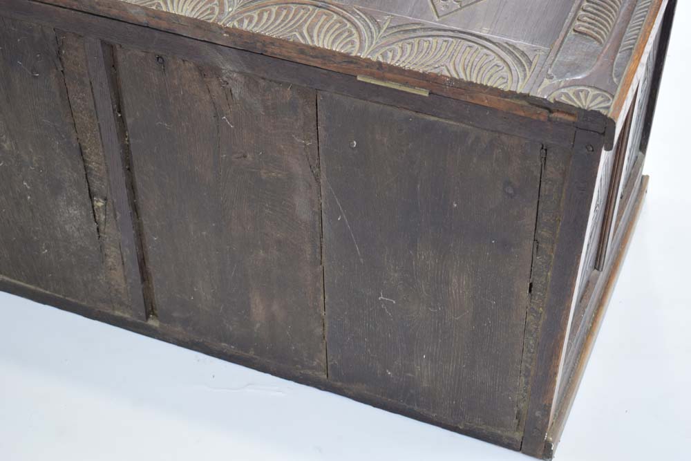 A 20th century oak and panelled coffer decorated with carved foliate carvings throughout, l. - Image 5 of 8