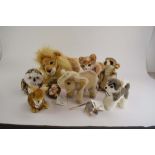 Nine Steiff stuffed animals modelled as a lion, an elephant, an owl,