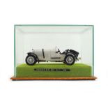 A Burago 1/18 scale kit built 1928 Mercedes Benz SSKL, cased, case w.