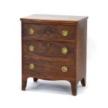 A 19th century mahogany bow fronted chest of three drawers on splayed feet, w.