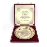 A shallow silver dish of circular form commemorating the 65th anniversary of Queen Victoria's