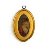 A late 18th century miniature head and shoulders portrait of a female,