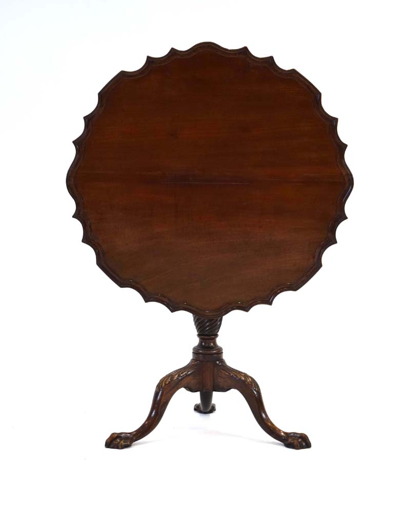 An 18th century and later mahogany supper table, the tilt-top with a piecrust border,