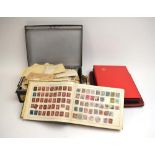 A collection of mainly George VI and later stamps contained in four albums and a vintage tin