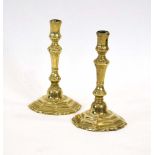 A pair of 18th century brass candlesticks, h.