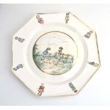 A late Victorian Minton cabinet plate of octagonal form, later decorated with children at play, w.