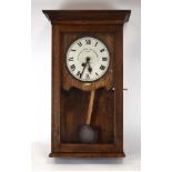 A Gledhill-Brook Time Recorder Ltd. clocking-in machine in an oak case, h.