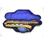 A cased Champion brass finished saxophone CONDITION REPORT: Please see additional