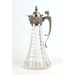 A silver mounted repousse decorated claret jug of typical form maker R&B, Sheffield 1973, h. 30.