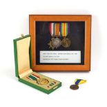A presentation case containing a First World War trio of medals awarded to 69303 Gunner H.