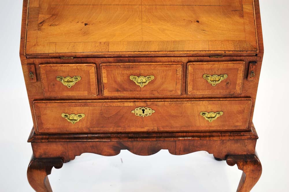 An early 18th century and later walnut bureau on stand, - Image 2 of 24