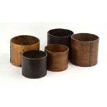 A group of five mid-20th century bentwood grain measures CONDITION REPORT: The three