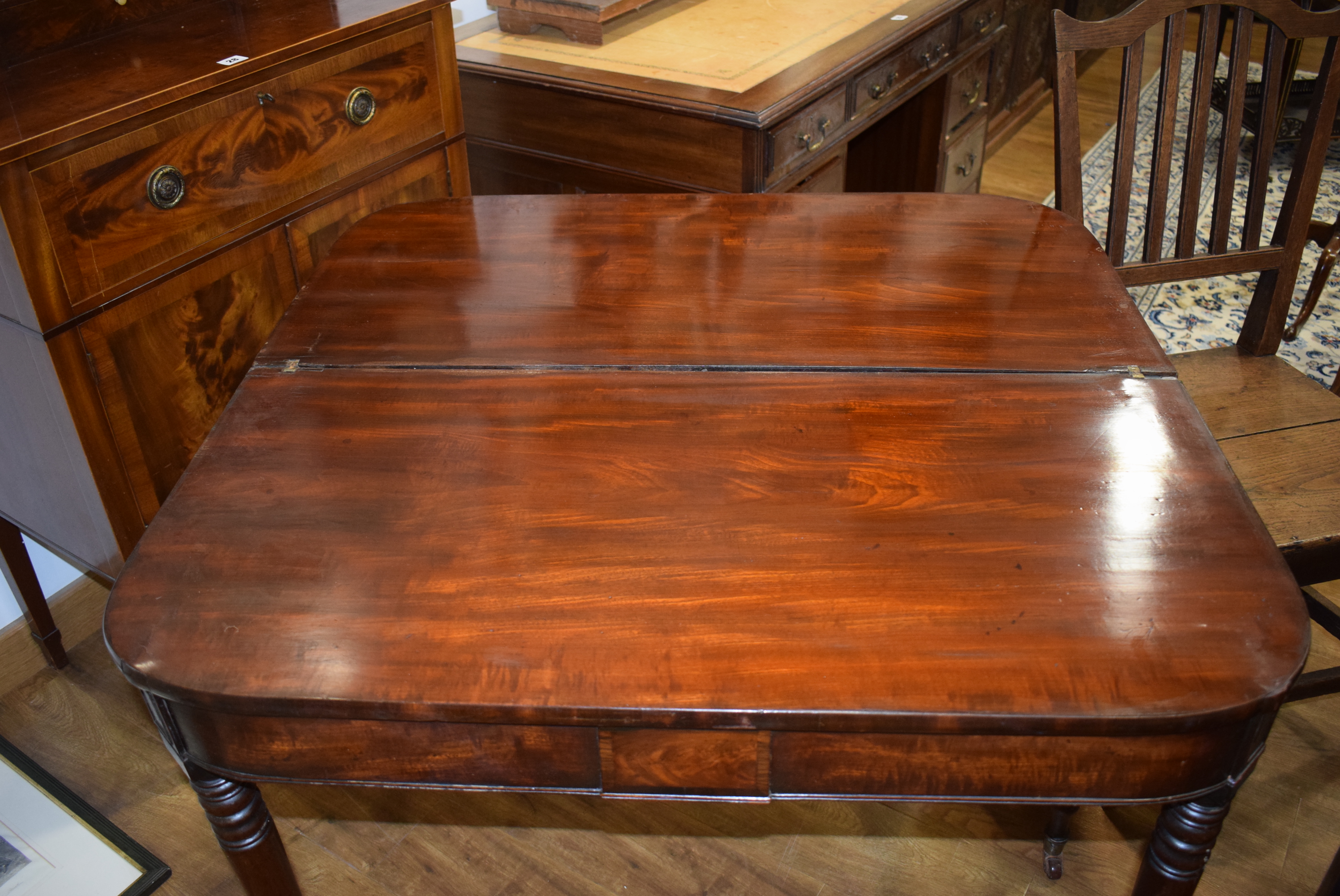 A George III mahogany tea table, the plain frieze over turned tapering legs with castors, w. - Image 14 of 18