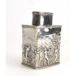 A late Victorian silver caddy of rectangular form repousse decorated with classical scenes and