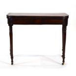 A George III mahogany tea table, the plain frieze over turned tapering legs with castors, w.