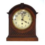 A late 19th/early 20th century table timepiece,