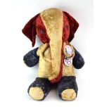 A red, white and blue stuffed elephant mascot with badges for the Richard Nixon campaign, l.