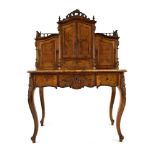 A 19th century French bonheur de jour, or writing table, the superstructure enclosing four drawers,