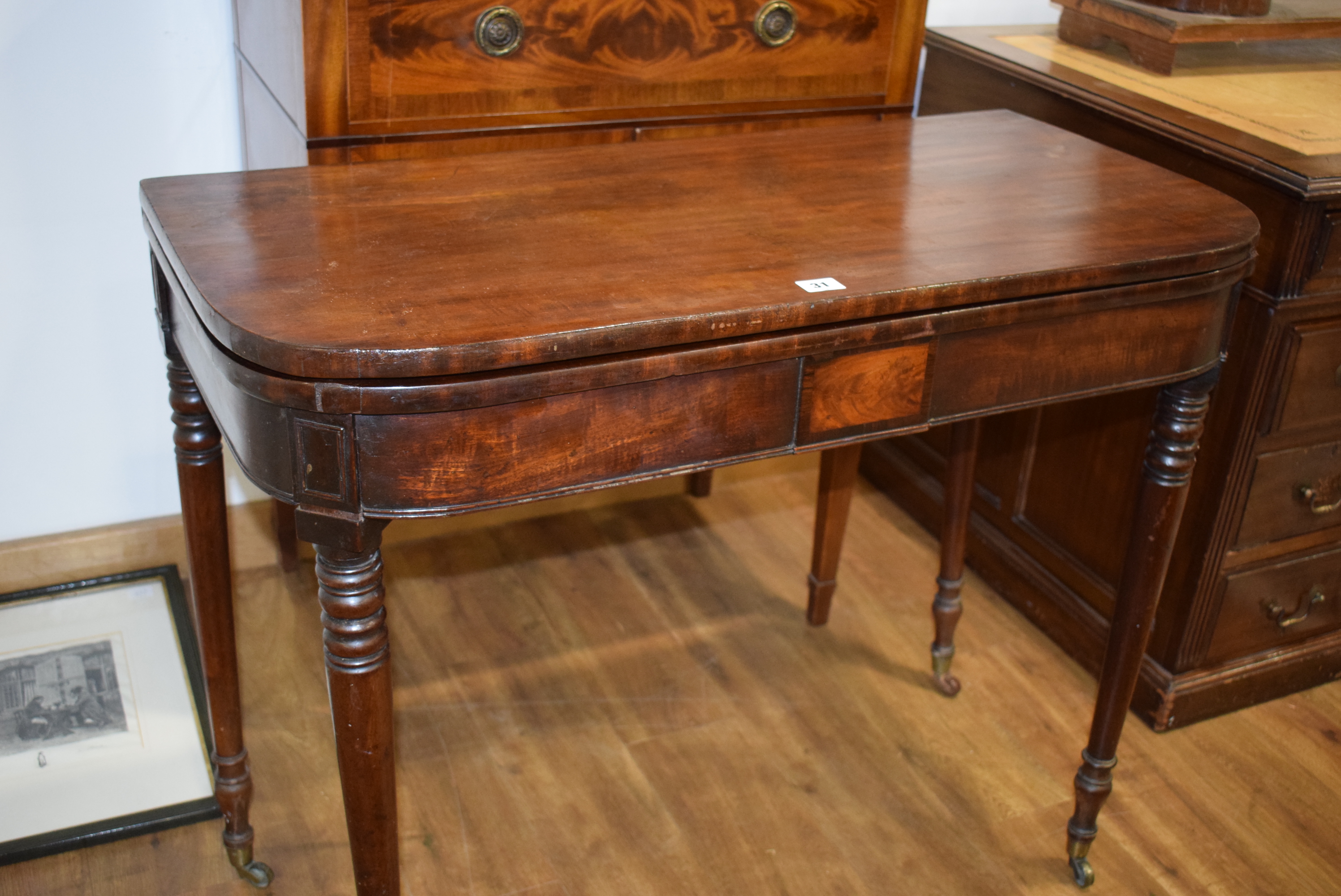 A George III mahogany tea table, the plain frieze over turned tapering legs with castors, w. - Image 17 of 18