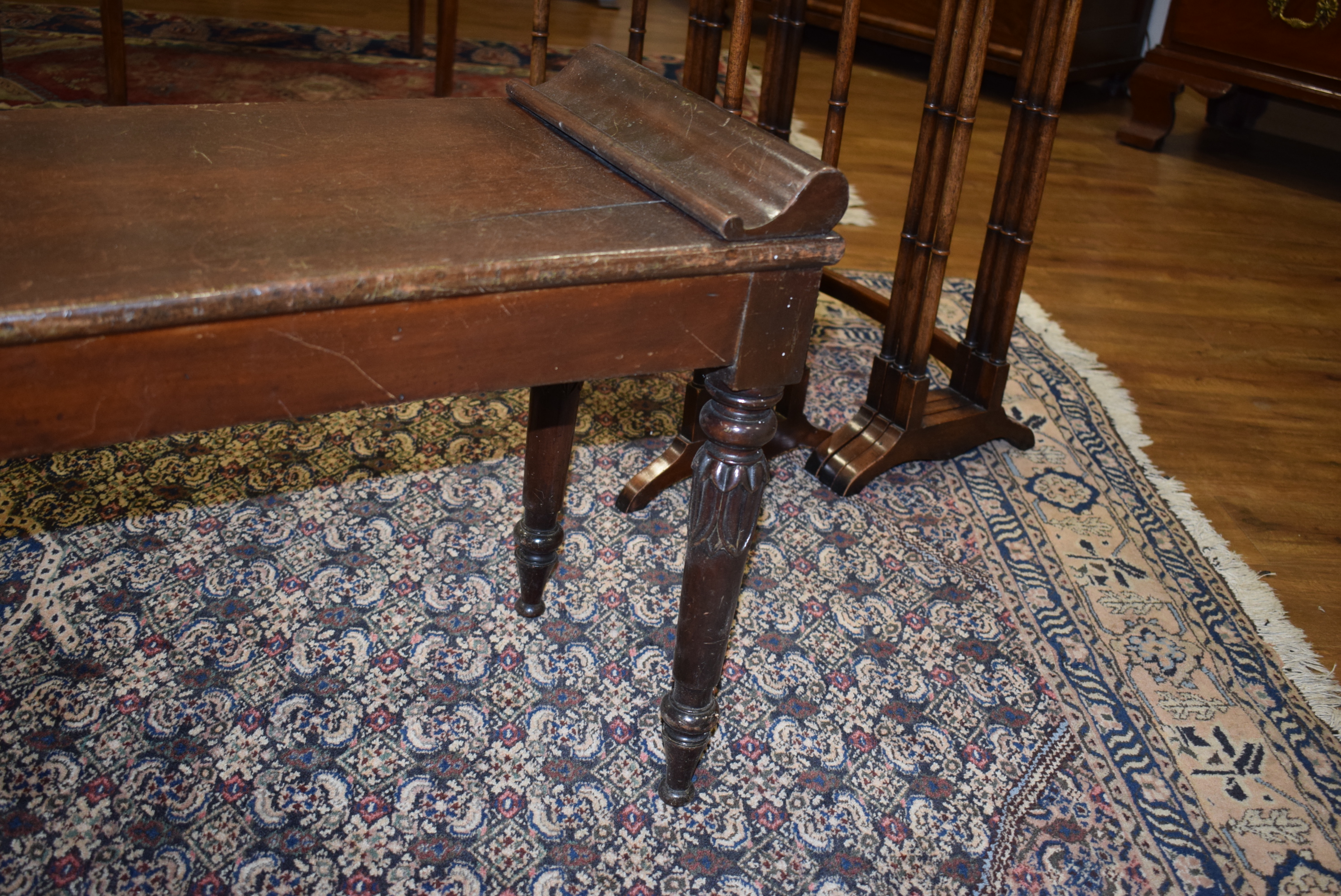 A late 19th century mahogany window seat with scrolled ends and turned legs with acanthus-leaf caps - Image 11 of 20