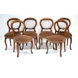 A set of six Victorian mahogany balloon back dining chairs on cabriole legs CONDITION