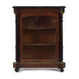 A Victorian walnut, ebony and brass mounted pier cabinet with a single door,