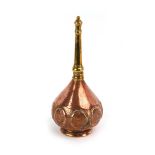 A Turkish brass and copper rose water sprinkler, h.