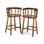 A pair of Stewart Linford elm and beech spindle back stools,