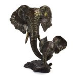 A Baranite bronze figural group modelled as an elephant and calf, designed by Mark Hopkins, h.