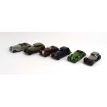 Six loose mid-20th century Dinky saloon cars including Alvis, Laconda etc.