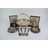A small group of silver plate including a set of twelve Christofle cake forks,
